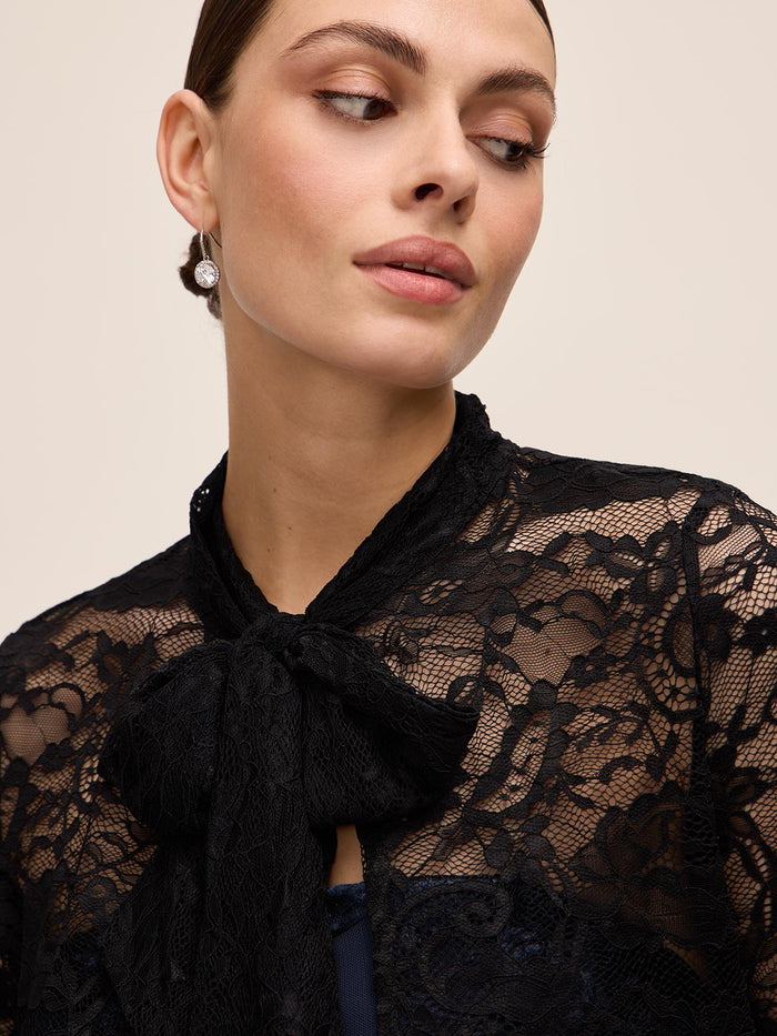 Black Lace Bolero with 3/4 Sleeves and Bow Ties - Close-up Fabric Detail - Le Chateau