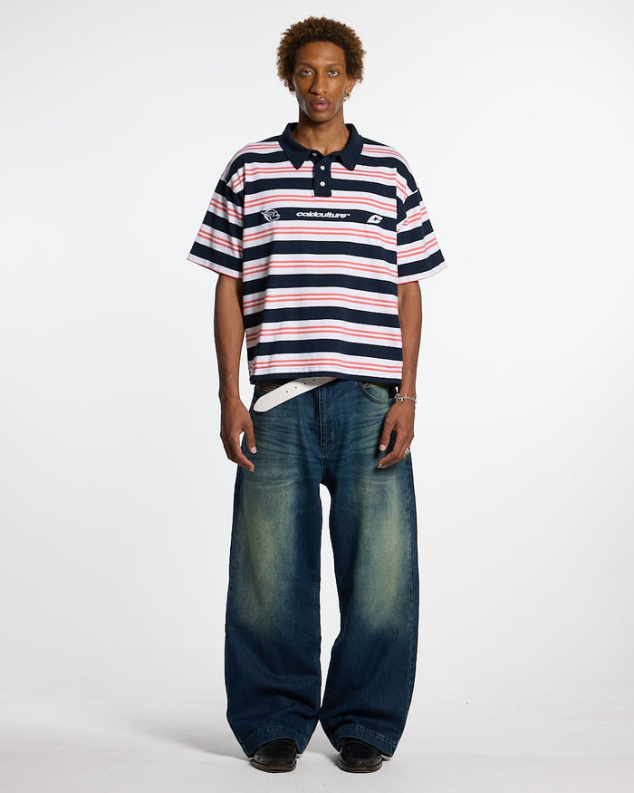 AEROSTRIPES POLO BLUE SEA/CORAL - navy and coral striped polo shirt, front view on male model - Cold Culture #man