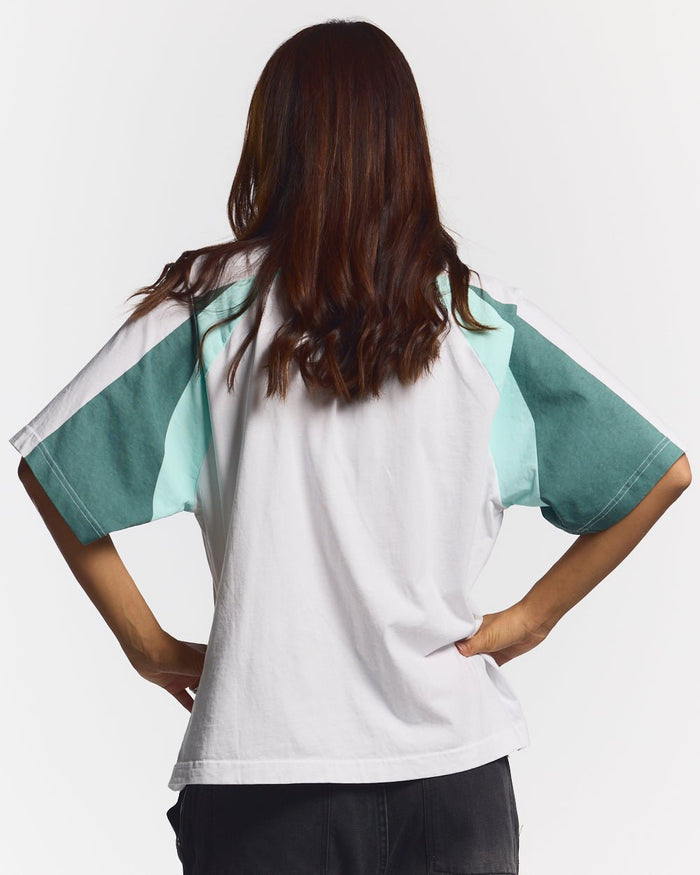 AIRBORNE TEE WHITE AND GREEN - white and green raglan tee, back view on female model - Cold Culture #woman