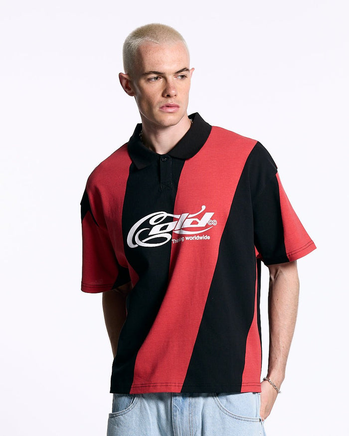 ASLANT STRIPES POLO TEE BLACK AND RED - red and black striped polo shirt, front view on male model - Cold Culture #man
