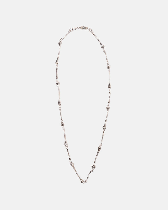 BONES NECKLACE - silver bone link necklace, flat lay - Cold Culture