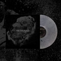 A Salt & Pepper vinyl record by Ion Dissonance is partially out of its dark, abstract album sleeve, which displays blurry overlapping faces in black and gray along with the band name and "Cast the First Stone" tracklist.