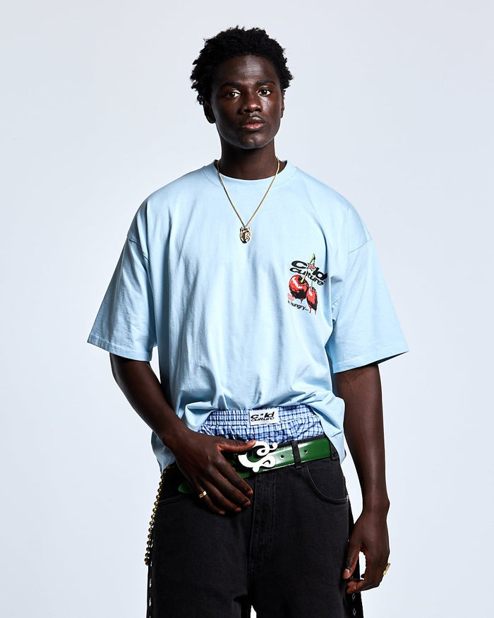 CHERRY TEE DREAM BLUE - light blue graphic print tee, front view on male model - Cold Culture #man
