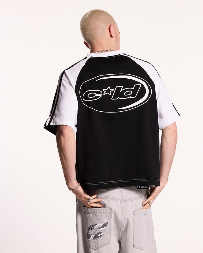 COMBO TEE BLACK - black and white raglan tee, back view on male model - Cold Culture #man