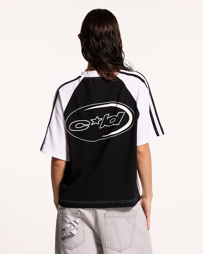 COMBO TEE BLACK - black and white raglan tee, back view on female model - Cold Culture #woman
