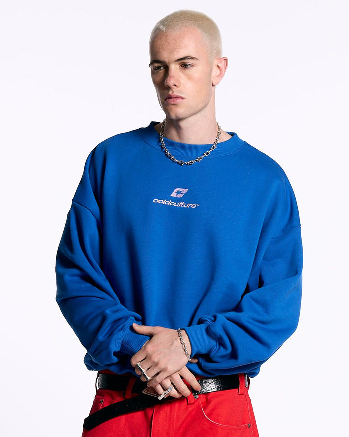 CURVED CREWNECK BLUE - blue oversized crewneck sweatshirt, front view on male model - Cold Culture #man