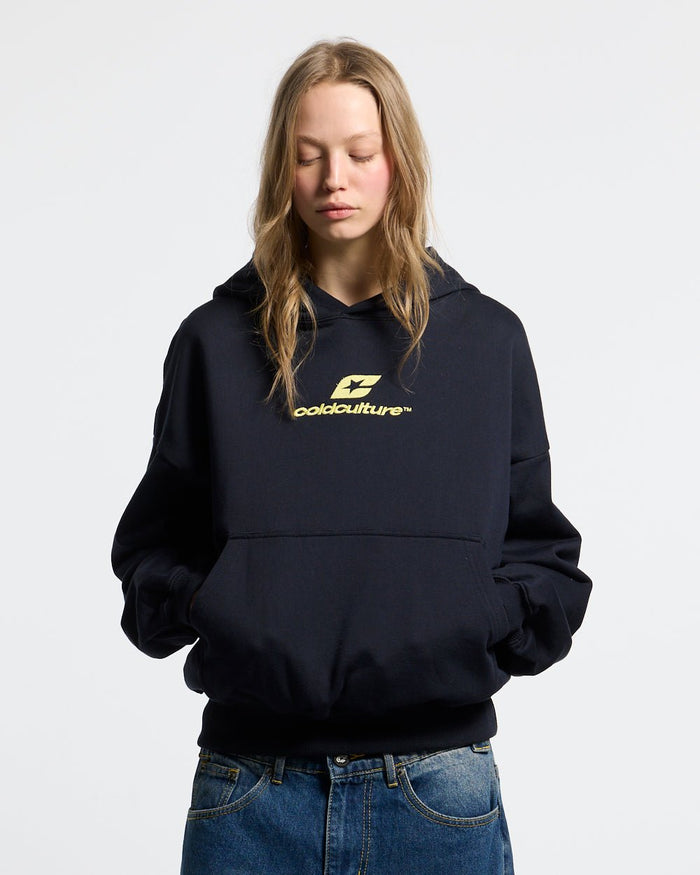 CURVED HOODIE MIDNIGHT BLUE - navy blue oversized hoodie, front view on female model - Cold Culture #woman