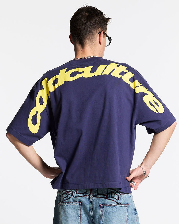 CURVED TEE ECLIPSE - navy blue oversized tee, back view on male model - Cold Culture #man