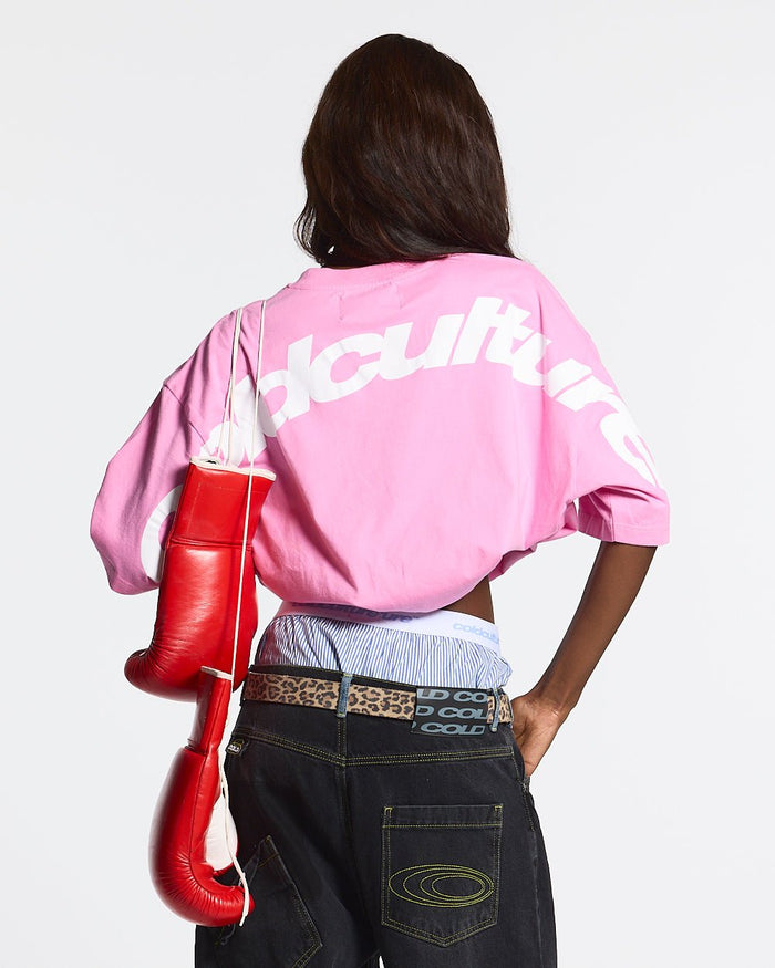 CURVED TEE FUCHSIA PINK - pink oversized tee, back view on female model - Cold Culture #woman