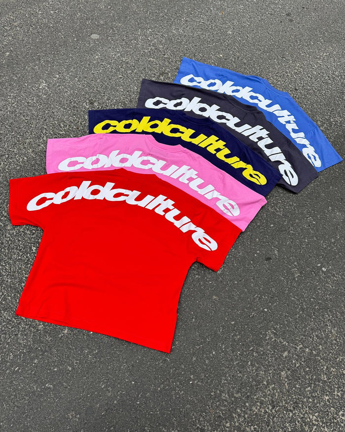 CURVED TEE RACING RED - red oversized tee, flat lay with matching pieces - Cold Culture