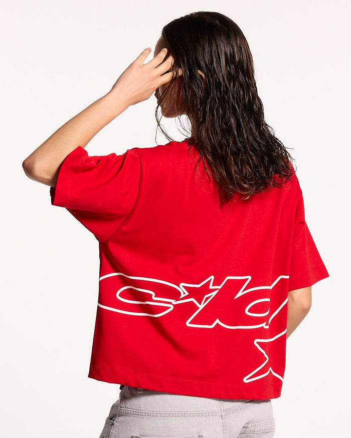 DEFENSE TEE RED - red graphic print tee, back view on female model - Cold Culture #woman