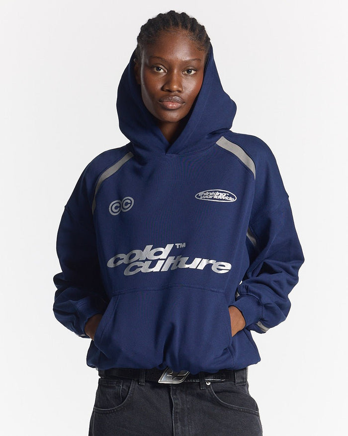 DETAILED HOODIE INDIGO BLUE - navy hoodie with contrast piping, front view on female model - Cold Culture #woman