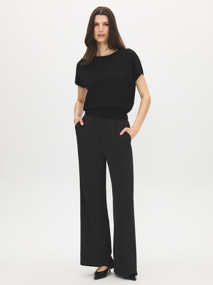 Black Dolman Sleeve Crew Neck Sweater - Woman Wearing Relaxed Knit Top - Suzy Shier