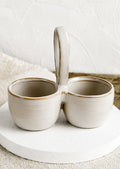 A double cellar ceramic vessel in off-white glaze.