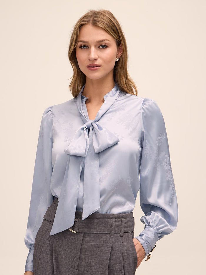 Steel Blue Floral Damask Tie Neck Bow Blouse - Woman Wearing Elegant Woven Top - Le Chateau