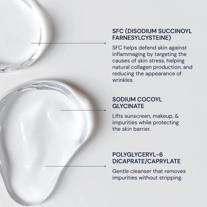 Clear liquid droplets with text about skincare ingredients on a light gray background