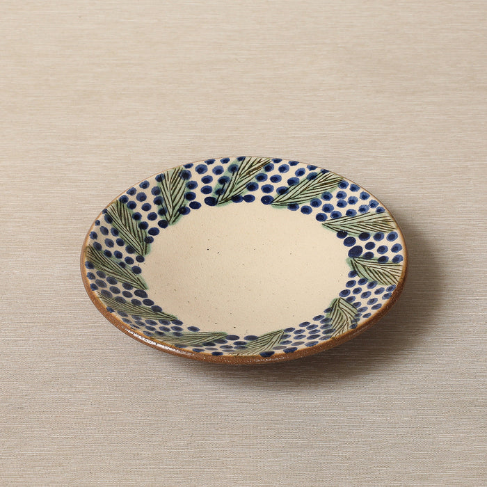 Hand painted plate with wreath decorated edge