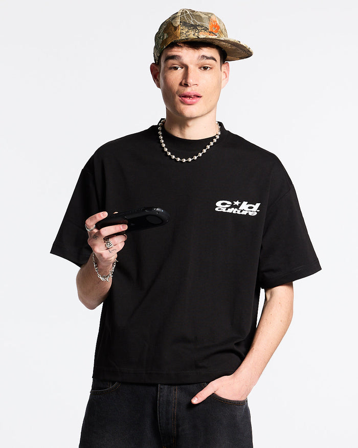 HEART ASHTRAY TEE BLACK - black graphic print tee, front view on male model - Cold Culture #man