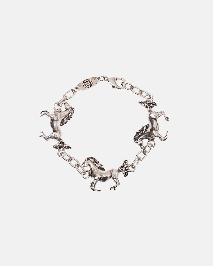 HORSE BRACELET - silver horse charm bracelet, flat lay - Cold Culture