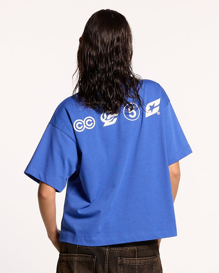 LET'S BOUNCE TEE BLUE - blue graphic print tee, back view on female model - Cold Culture #woman