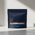 Protein package labeled 'Longevity Protein' on a neutral background