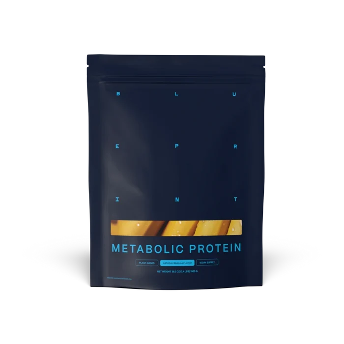 Dark blue package of Metabolic Protein banana flavor on a white background #banana_15-day