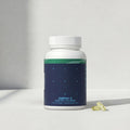 Omega-3 supplement bottle with capsules on a light gray background