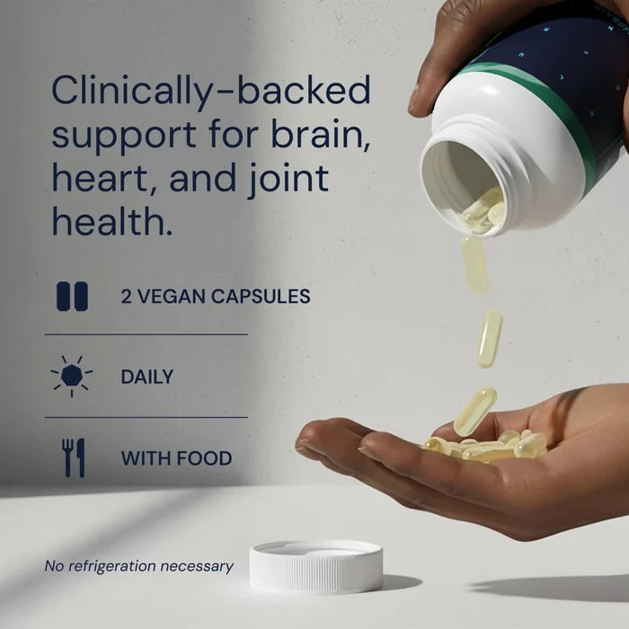 Vegan capsules being poured from a bottle into a hand with text about brain, heart, and joint health support.