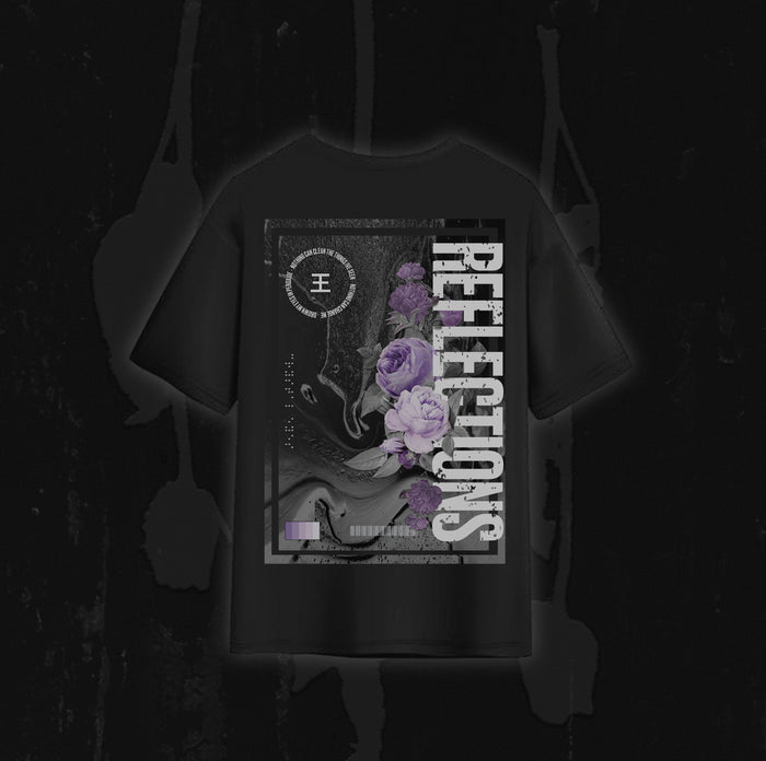 A black t-shirt from Reflections featuring a graphic design of purple roses, abstract patterns, and the word "REFLECTIONS" in bold white letters—ideal for fans of Crystal Eyes or collectors of digital downloads and instrumental versions.