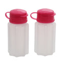 pink plastic salt and pepper shakers