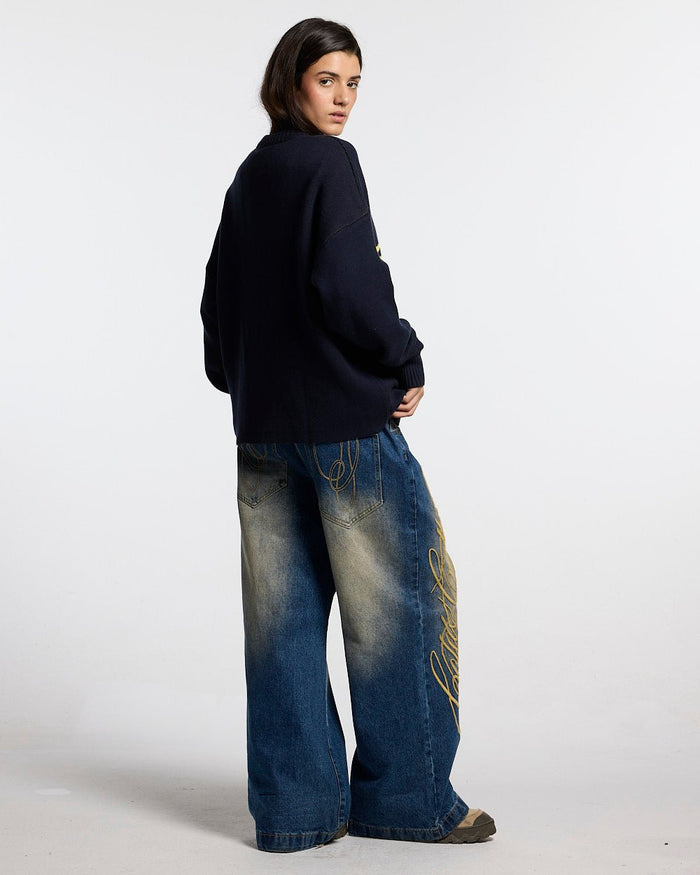 POISON KNITWEAR HEAVY BLUE - navy blue scorpion knit sweater, back view on female model - Cold Culture #woman