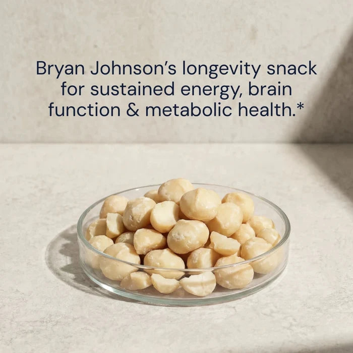Glass bowl of macadamia nuts on a light background with text about sustained energy, brain function, and metabolic health.