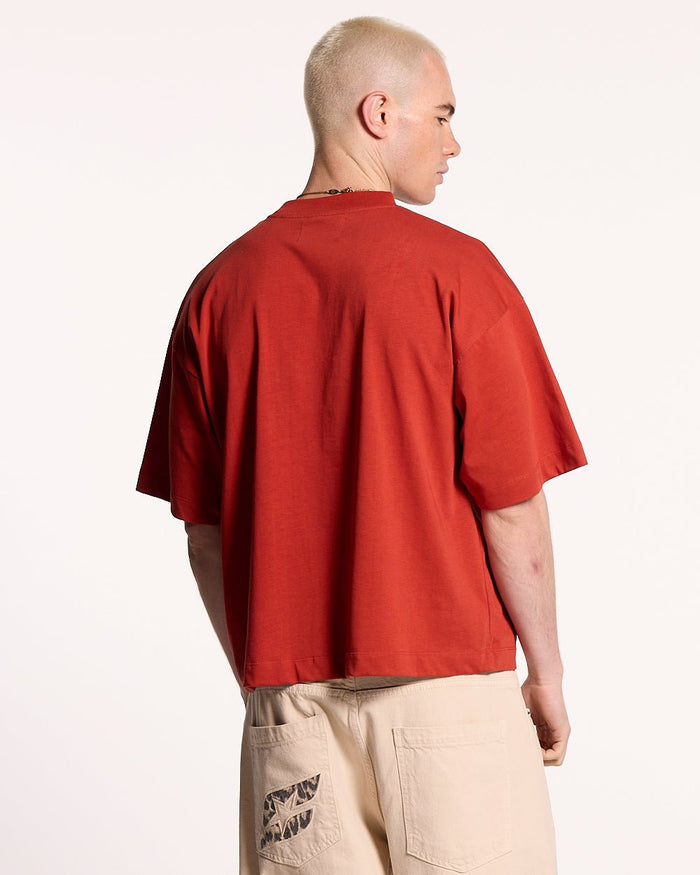 RELENTLESS TEE BURGUNDY - burgundy graphic print tee, back view on male model - Cold Culture #man