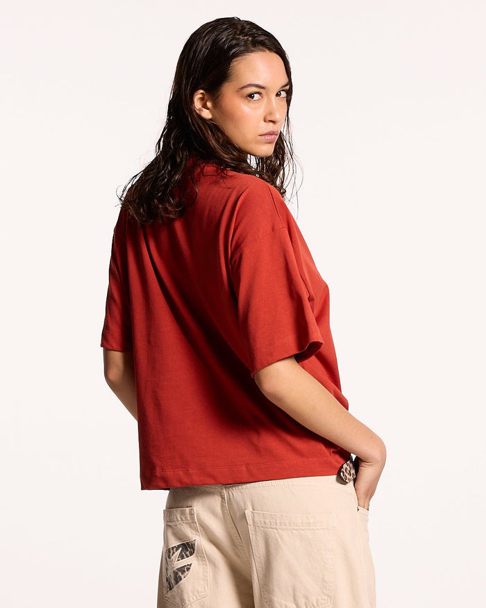 RELENTLESS TEE BURGUNDY - burgundy graphic print tee, back view on female model - Cold Culture #woman