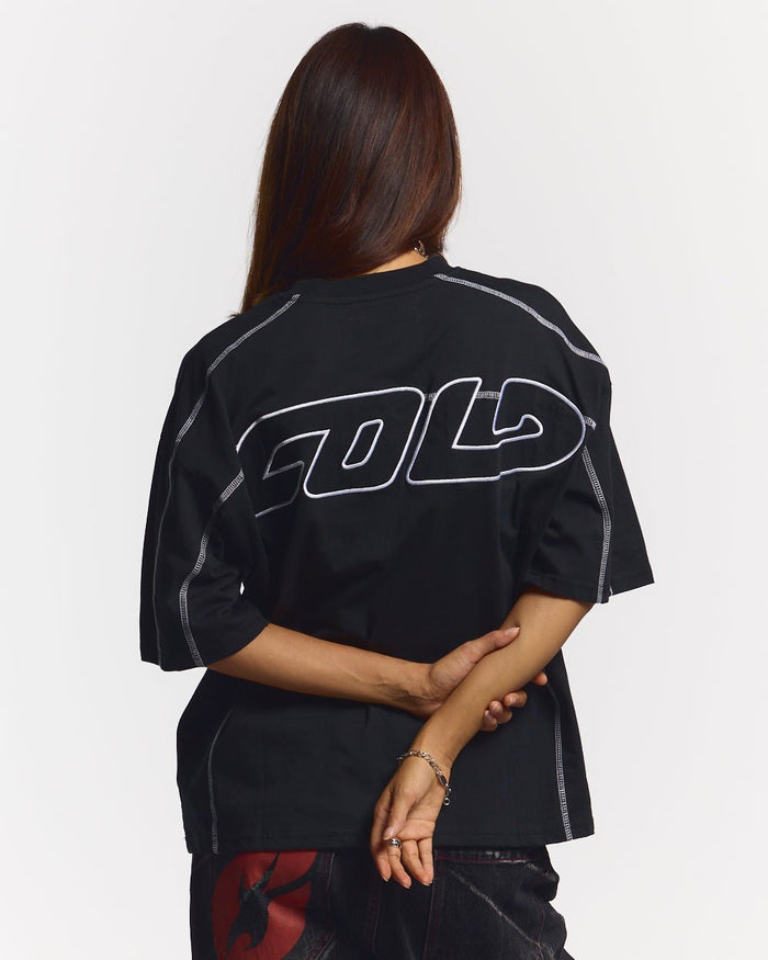 ROLLER TEE BLACK - black contrast stitch boxy tee, back view on female model - Cold Culture #woman