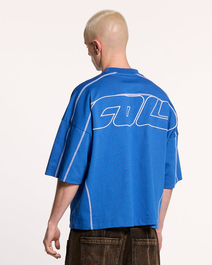 ROLLER TEE BLUE - blue oversized tee, back view on male model - Cold Culture #man