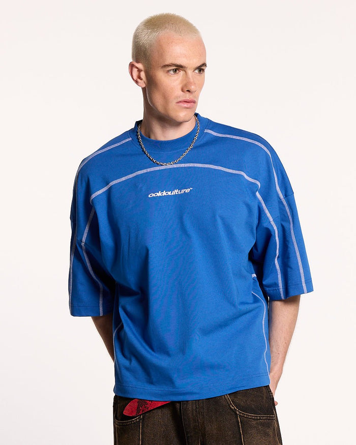 ROLLER TEE BLUE - blue oversized tee, front view on male model - Cold Culture #man