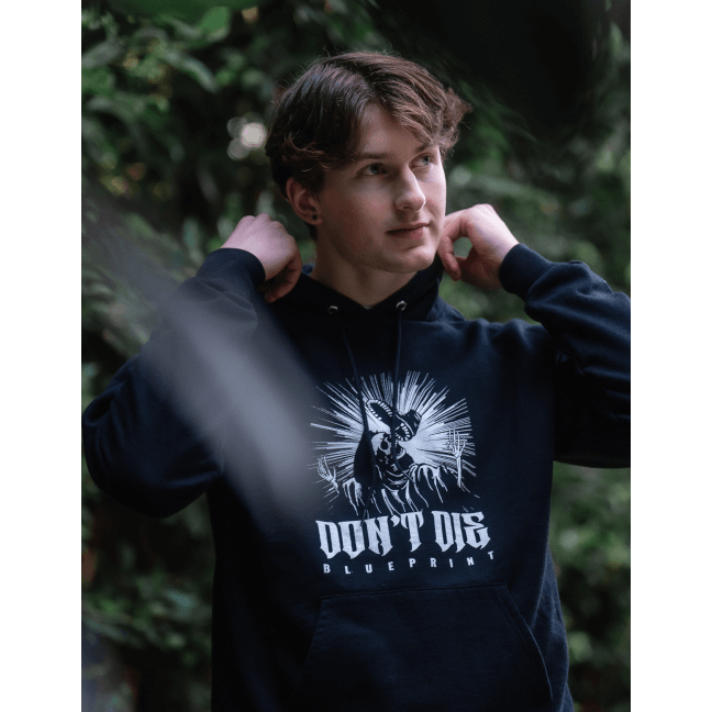 Lifestyle image of boy wearing Skull Kick Hoodie