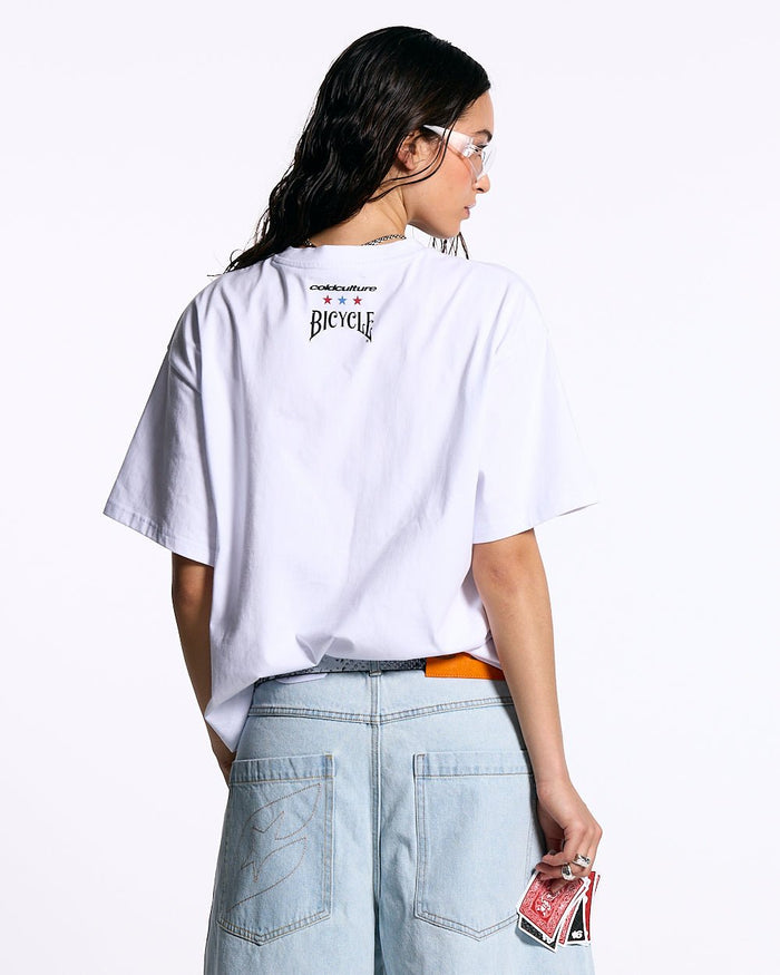 SOUVENIR BICYCLE TEE WHITE - white graphic print tee, back view on female model - Cold Culture #woman