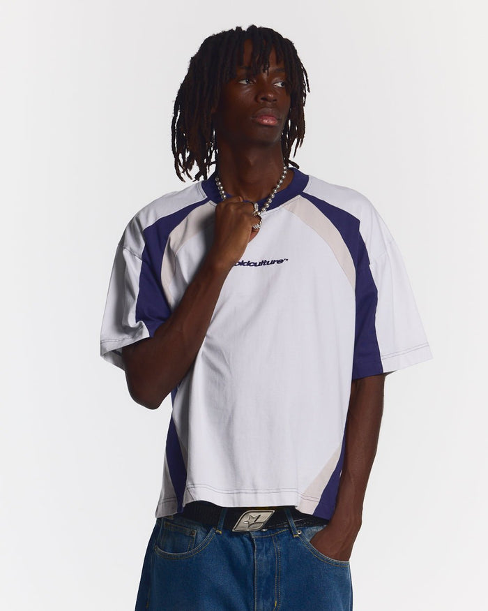 SPEED SPOKE TEE BLUE - navy and white panelled tee, front view on male model - Cold Culture #man