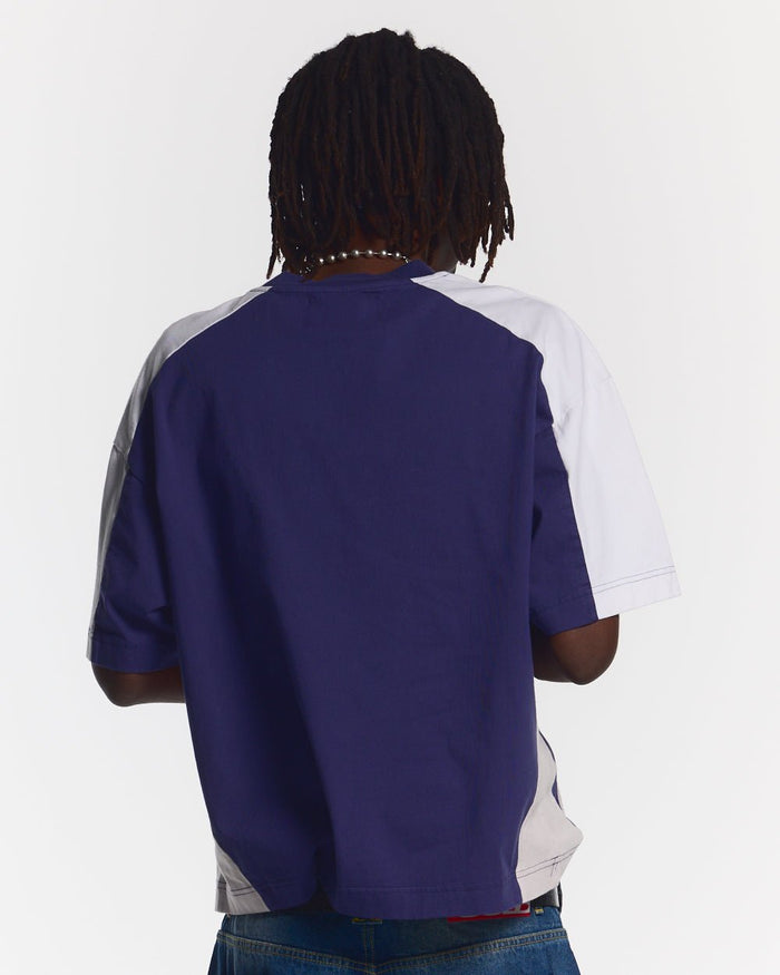 SPEED SPOKE TEE BLUE - navy and white panelled tee, back view on male model - Cold Culture #man