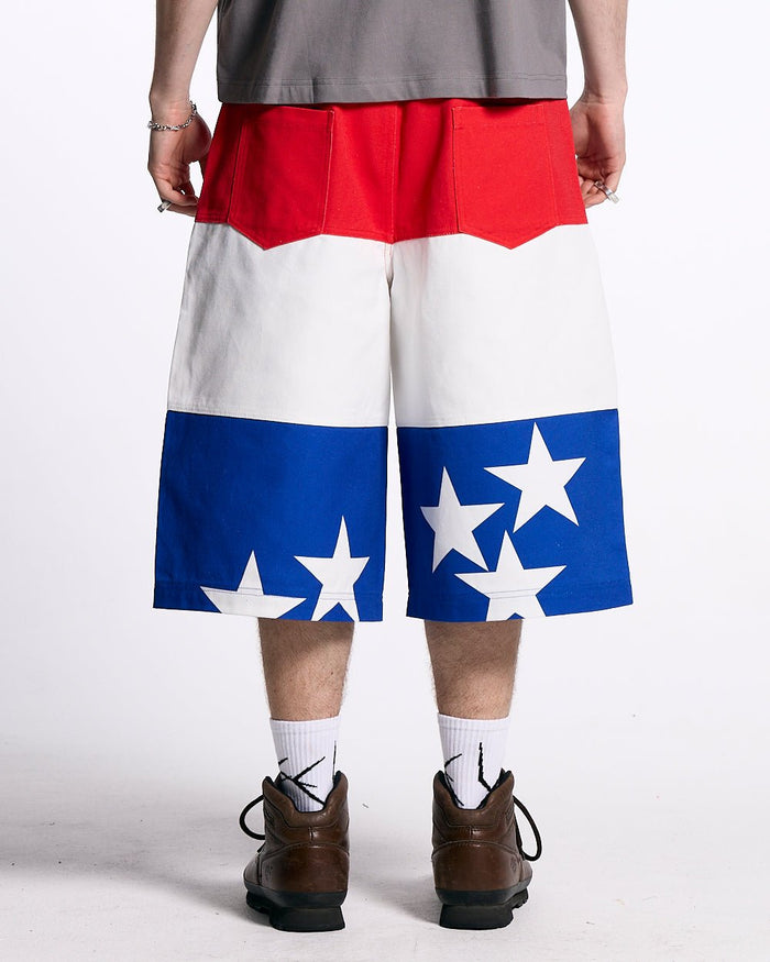 STARS JORTS RED WHITE AND BLUE - red white blue star print shorts, back view on male model - Cold Culture #man