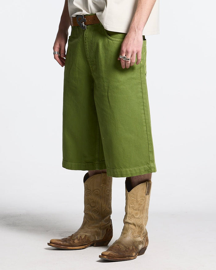 STITCHING JORTS CACTUS GREEN - green baggy denim shorts, front view on male model - Cold Culture #man