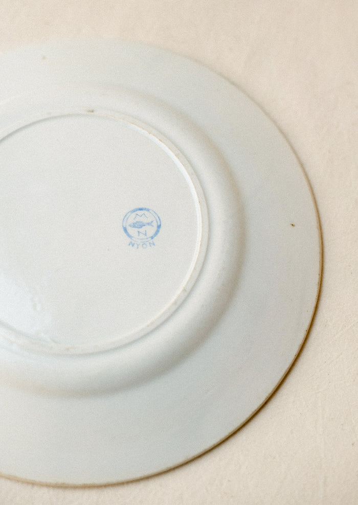 Blue fish maker's mark on back of plate.