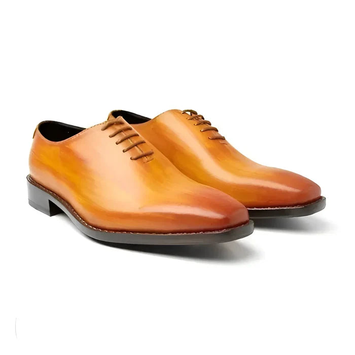 Pair of brown leather elegance wholecut luxury bespoke shoes for men