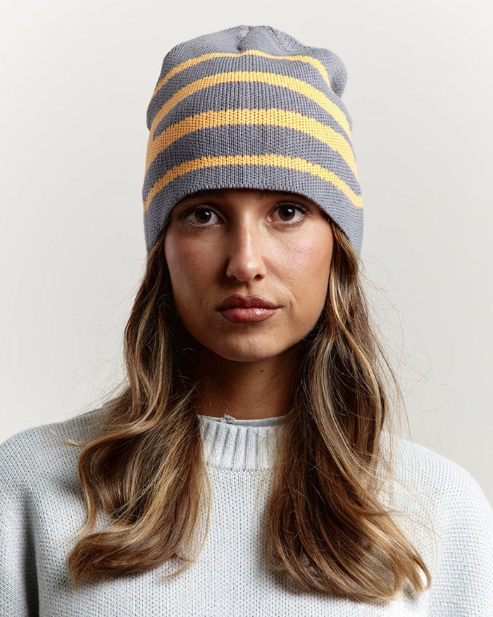 WORK BEANIE DUST GREY - grey striped knit beanie, front view on female model - Cold Culture #woman
